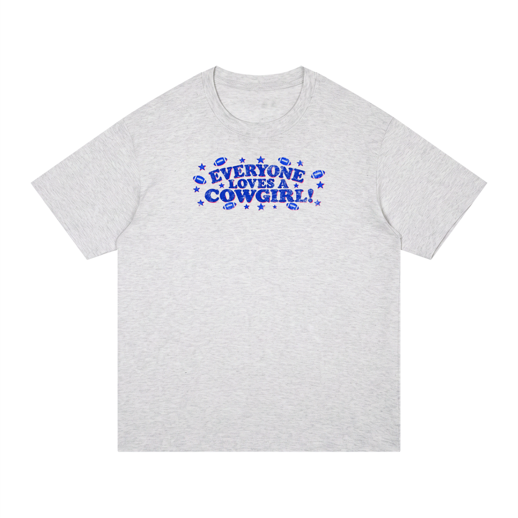 Everyone loves a cowgirl Unisex Regular Fit Cotton T-Shirt